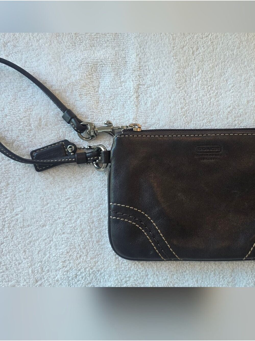 Coach Corner Zip Wristlet In Brown Leather